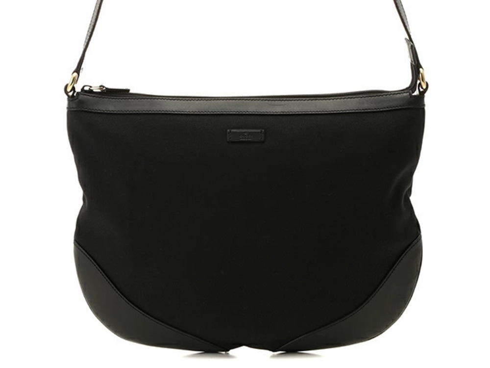 Gucci black canvas leather trim crossbody bag curved base